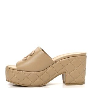 CHANEL Tan Quilted Platform Mules